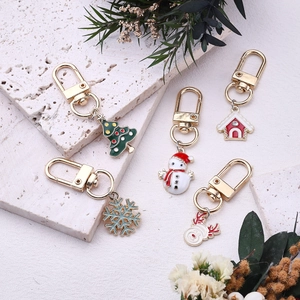 Christmas alloy keychains with tree, snowflake, snowman, deer charms and gold lobster clasps