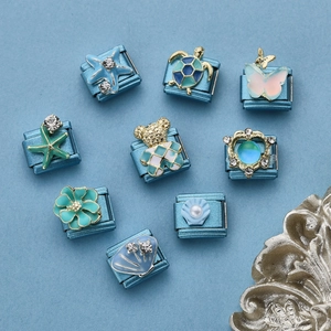 Italian charm links featuring sea creatures and light blue enamel in stainless steel
