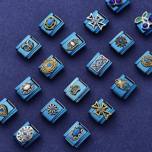 Italian modular charm bracelets in dark blue stainless steel with vintage gold relief
