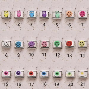 DIY Italian charm link collection with panda, smiley faces, and evil eye designs in steel
