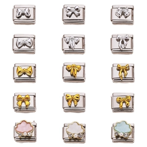 Italian modular charm bracelet links with bow and pearl accents in gold and silver