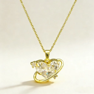 Golden Saturn heart necklace with sparkling crystal pendant and dainty chain for women