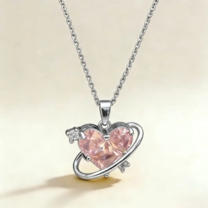 Pink heart crystal planet necklace with silver orbit ring and sparkling rhinestones