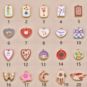 Set of 20 hand-painted enamel DIY charms in heart, flower, and animal shapes for jewelry