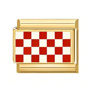 Detailed macro view of gold-plated stainless steel checkered flag charm link