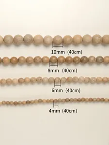 Size chart for natural camphor wood beads showing 4mm to 10mm diameters and 40cm length