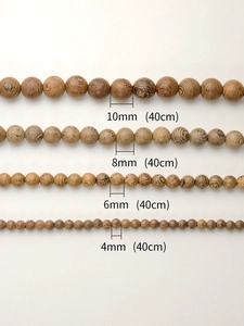 Comparison of 4mm to 10mm wenge wood beads with distinct natural V-shaped grain patterns