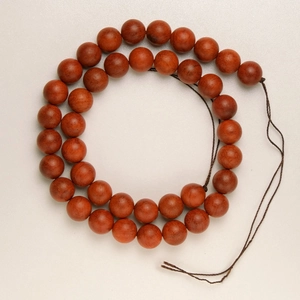 Perline rotonde in palissandro bruno-rosso lucidate per creazione gioielli fai-da-te