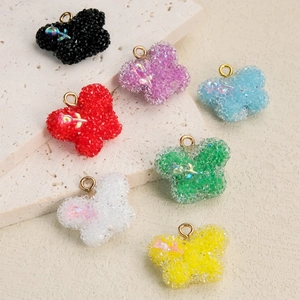 Pendentifs papillon en résine colorée avec texture sucrée et petite rose pour bijoux DIY