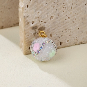 Spherical beaded candy pendant with pastel flowers and rainbow rhinestones for DIY necklaces