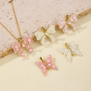 Colgante de Mariposa Lazo de Cobre Con Circonitas Microengastadas y Perla Artificial Bañado en Oro 18K Accesorio Joyería DIY Mujer