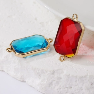 Rectangle faceted gemstone pendants in blue and red with gold metal edges and double loops