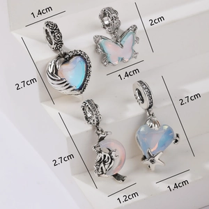 S925 Silber Anhänger-Set in Ozeanblau mit Herz-, Schmetterling- und Einhorn-Charms