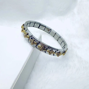 Bracelet à breloques italien en acier inoxydable avec maillons abeille dorés et base argent
