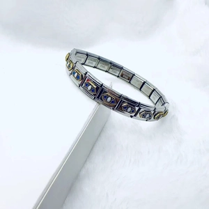 Vintage stainless steel Italian modular bracelet with blue and white floral enamel details