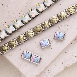 Italian charm bracelet in stainless steel with colorful enamel butterfly and snowflake charms