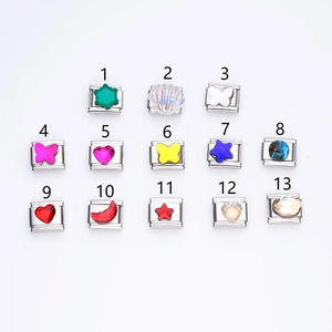 Italian charm link collection with stainless steel base and colorful resin star butterfly designs