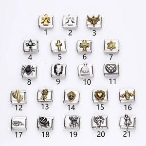 Variety of 21 Italian modular charms in stainless steel with vintage religious and animal motifs