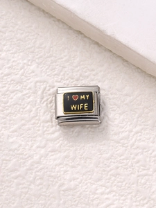 Macro view of Italian charm link in stainless steel with I Love My Wife enamel design