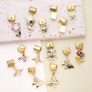 Gold stainless steel Italian modular charms with bee, butterfly, and heart designs