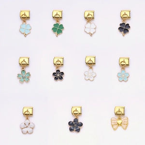 Italian charm link bracelet set featuring clover and flower charms in gold finish