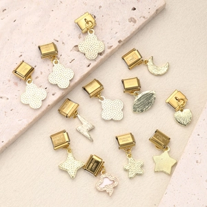 Gold Italian charm links with clover moon and star pendants in stainless steel