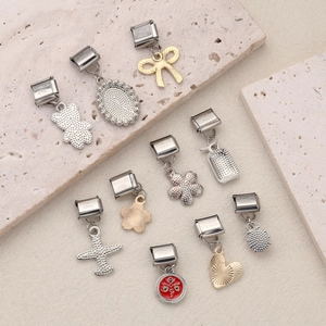 Italian charm bracelet links in stainless steel with red enamel and diverse patterns