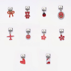 Italian charm link set with ten red enamel pendants including hearts and butterflies