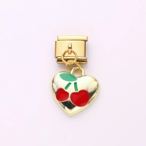 Italian modular charm bracelet link featuring gold heart with red cherry enamel pattern