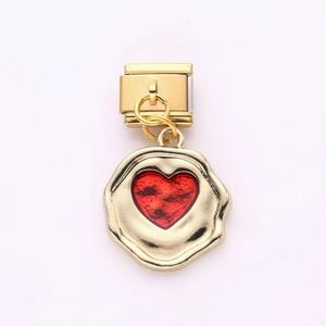 Macro shot of Italian modular charm with golden disc and red textured heart detail