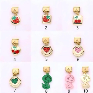 Italian modular stainless steel charms featuring strawberry, cherry, and colorful snake designs