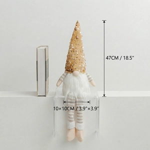 Detail shot of a seated Christmas gnome doll with dimensions of 47cm height and 10cm base