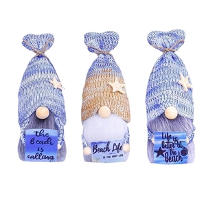 Three nautical summer gnomes with knitted hats and starfish decor on a white background