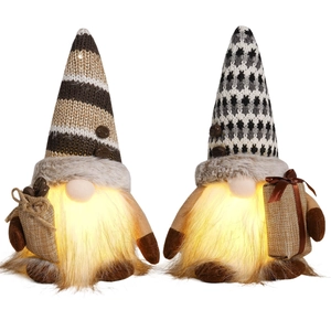 Pair of glowing coffee gnome figurines with knitted hats and warm LED lights for home decor