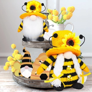 Pair of bumble bee gnome plush figurines with sunflower hats for spring home decoration