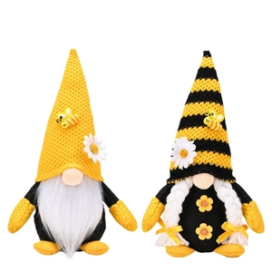 Pair of bee festival gnomes with sunflowers and striped hats on a white background