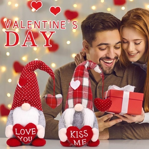 Handmade Valentine's Day gnomes plush set with heart decorations in warm romantic setting