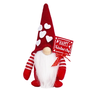 Valentine's Day gnome doll with red heart hat holding a Happy Valentine's Day sign