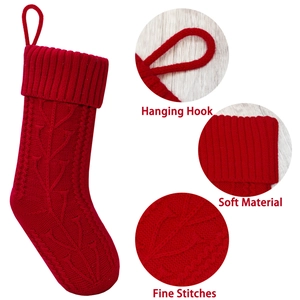 Red cable knit Christmas stocking with hanging hook and soft material texture