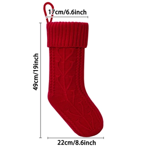 Red knit Christmas stocking dimensions featuring 19-inch height and classic cable pattern