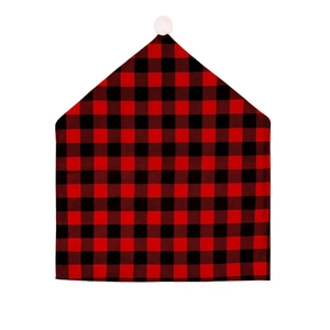 Christmas red and black buffalo plaid chair covers with white pom pom holiday decor