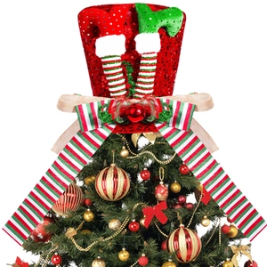 Christmas tree topper hat featuring striped elf legs and sequins with a large festive bow