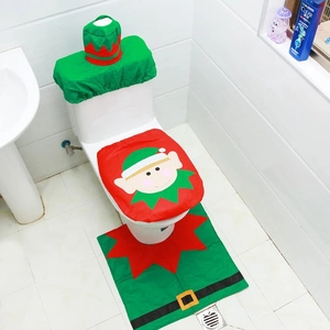 Christmas elf toilet seat cover set with matching water tank lid and decorative rug