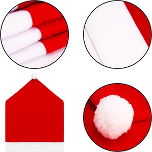 Detail view of red and white soft plush Christmas chair cover with white fluffy pompom