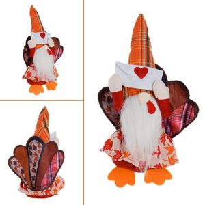 Thanksgiving turkey gnome plush with maple leaf dress and orange plaid hat on white background