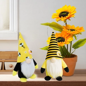 Detailed plush texture and fine stitching on bee gnome dolls with sunflower decor