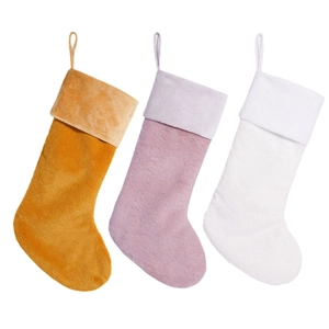 Three-piece set of large minimalist plush Christmas stockings in tan, purple, and white