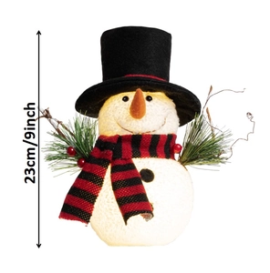 Detail of 23cm lighted snowman ornament with red-black scarf and glowing warm lights