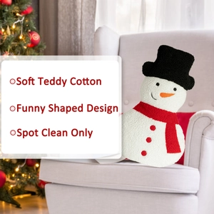 Detail of soft teddy cotton snowman pillow featuring funny shaped design and plush texture
