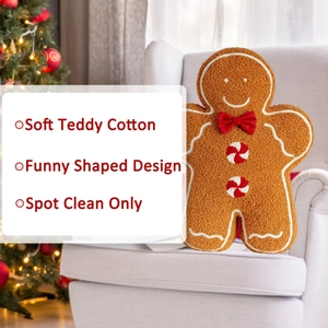 Detail of soft gingerbread man pillow in teddy cotton fabric on a cozy sofa